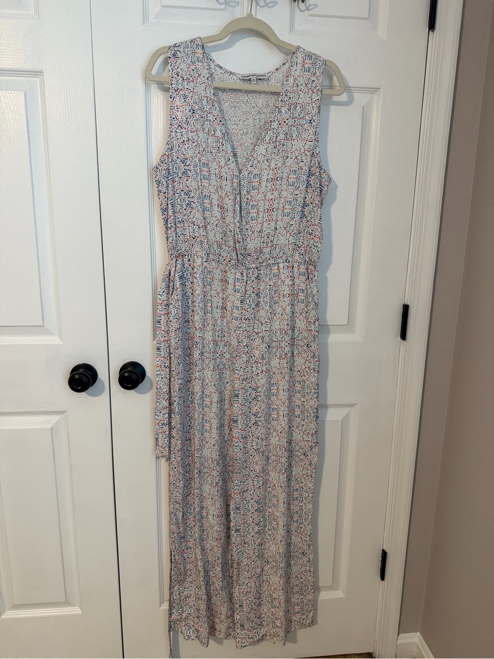 Sleeveless Printed jumpsuit in White with Blue & Coral Accents